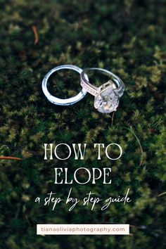 two wedding rings with the words how to elope on them and moss growing in the background