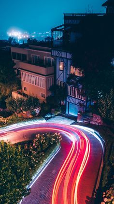 long exposure photograph of light trails on the road