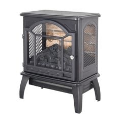 a black stove with logs in it