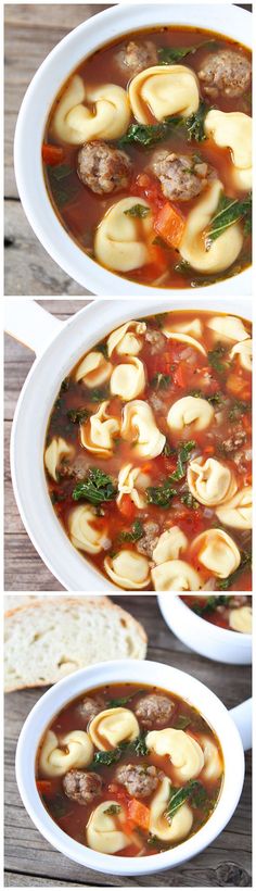 a white bowl filled with tortellini soup on top of a wooden table