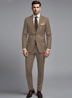 Ignite your fearless spirit with the opulent Noble Brown Wool Silk Linen Suit, a powerful statement of unrivaled style. With its exquisite blend of wool, silk, and linen, it exudes sophistication. Feel the smooth, lightweight fabric drape gracefully around you, enhancing your every move. From formal events to casual occasions, this luxurious suit elevates your wardrobe. Own this pinnacle of sartorial excellence now.    About Noble Collection:  A seamless union of refined craftsmanship and Italian luxury. Impeccably tailored from superior wool, silk, linen, these contemporary designs embody sophisticated elegance. Experience the breathability of wool, brilliance of silk, freshness of linen – distinctive hallmarks defining the Noble Collection. Immerse yourself in this timeless ensemble, whe