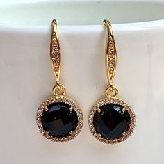 Lightweight and easy to wear, these dainty earrings are also elegant and classic. The bezel set 8mm faceted round onyx gemstones are surrounded by sparkly cz's set in gold bezels and suspended from equally sparkly gold ear wires that have cz's set in them as well. All jewelry is sent to you packaged in a gift box that is tied off with ribbon and a charm, ready for gift giving. Baroque Pearl Necklace, South Lake Tahoe, Onyx Earrings, Station Necklace, Dainty Earrings, Black Pearl, Lake Tahoe, Bezel Setting, Ear Wires