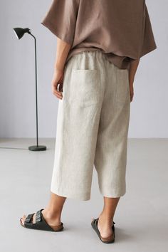 "Men's cropped linen pants Color on the picture - Beige. Wild leg pants are made from 100% Linen and available in a variety of colors These pants are versatile, they are cozy and comfortable outdoors as well as at home. The fabric is breathable and takes the body shape, over time it becomes softer and more pleasant. Flax has a massaging effect, the fabric is antiseptic and relieves stress. Look sizes below _ _ _ _ _ _ _ _ _ _ _ _ _ _ _ _ _ _ _ _ _ _ _ _ _ _ _ _ _ _ _ _ Details: -We sew only from Linen Pants Men Aesthetic, Men’s Linen Pants Outfit, Relaxed Linen Pants Men, Linen Shorts Men, Linen Trousers For Men, Natural Linen Pants, Men’s Linen Shorts, Loose Linen Pants, Men Loungewear