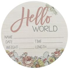 a wooden sign that says hello world with flowers on the front and back of it