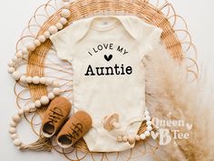 I Love My Auntie Onesie®, Aunt Baby Onesie®, Baby Announcement To Aunt, Aunt To Be Baby Reveal Baby Onesie®, I Love My Auntie Toddler Tee. All Onesies® & Toddler's T shirts are made to order. 100% Cotton Gerber Onesies® Brand Bodysuit 100% Cotton Gerber Toddler's T shirt. We Decorate Our Onesies® & Toddler's T shirts with Trending cool graphics and designs. Onesies® are super soft and comfortable. It's perfect for your little one to wear while playing outside or lounging around the house. *Pleas Baby Announcement To Aunt, Aunt Onsies, Auntie Onesie, Onesie Baby Announcement, Aunt Onesie, Aunt Baby, Aunt To Be, Baby Aunt, Baby Reveal