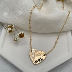 Love is always in style with our Hammered Personalized Heart Necklace. This customer favorite is ideal for initials, a date, a nickname, or a short word. The charming, vintage-style link chain is the perfect finishing touch and adds a romantic vibe. Available in sterling silver or gold finish. Chains and findings are 14kt gold fill or sterling silver. Charm is approx. 3/4 inch. Can be personalized with 6 characters max. Popular symbols for personalization are ♥ &, +(use * to symbolize the heart Elegant Brass Necklaces For Valentine's Day, Elegant Heart-shaped Brass Necklace, Elegant Brass Heart Necklace, Pendant Name Necklace For Anniversary Gift, Brass Heart Charm Necklace For Wedding, Elegant Brass Jewelry With Heart Charm, Dainty Charm Necklaces For Wedding, Brass Heart Pendant Jewelry For Anniversary, Brass Heart Pendant Jewelry For Wedding