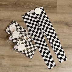 These comfortable and stretchy Finish Line Leggings are amazing for a cool day! Black and White Checkerboard pattern is a trendy and fun way to stand out. You will have your little cutie looking amazing. Cute Boutiques, Checkerboard Pattern, Finish Line, Pajama Pants, Kids Outfits, Leggings, Boutique, Black And White, Pattern