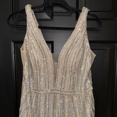 Embellished Silver/Nude Elegant Night Gown. Sleek Fitted Silhouette That Hugs The Body Perfectly With A Sophisticated V Neckline. Completed With Dazzling Details Like Rhinestone Embellishments. Embellished Champagne Gown With V-neck, Champagne V-neck Embellished Gown, Cinderella Divine, Night Gown, Cinderella, Sleek, Womens Dresses, Women Shopping