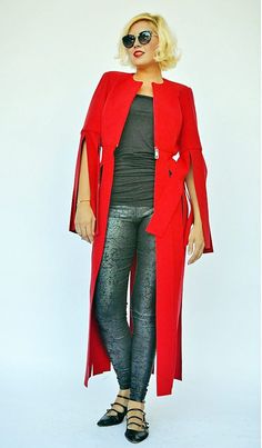 Coat for women with fringes, very playful, bold and daring. Versatile wool jacket, lined with satin in the upper side. The beautiful long coat color will for sure steal the spotlight this fall! This piece is a key element in the LA RAMBLA Collection, being a smooth cocktail of elegance, class, avant-garde and the very modern vibe of the urban scenery in which we live in. Material: 30% wool, 70% polyester Care instructions: Dry clean only The model in the picture is size S. Can be made in ALL SIZ Long Winter Outerwear For Evening, Long Winter Evening Outerwear, Long Wool Evening Coat For Winter, Evening Wool Long Coat For Fall, Evening Long Wool Coat For Fall, Fall Evening Long Wool Coat, Evening Wool Coat For Fall, Chic Red Long Outerwear, Chic Long Red Outerwear