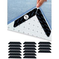 a hand is holding a piece of fabric with black dots on it and six pieces of blue