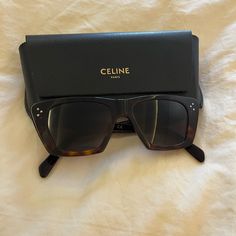 Like New Beautiful Celine Sunglasses. Only Wore A Few Times. No Scuffs. Color Is A Nice Brown Tortoise. Comes With Original Hard Sunglasses Case And Box. Price Was $485.10 With Tax. 100% Uv Protection Logo At Temples Lens Width: 51 Mm Bridge Width: 20 Mm Arm Length: 140 Mm Celine Cat Eye Sunglasses, Celine Accessories, Protection Logo, Celine Sunglasses, Colored Sunglasses, Tan Brown, Cat Eye Sunglasses, Tortoise, Uv Protection