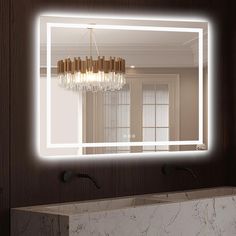 a bathroom mirror that has lights on in front of it and a marble counter top