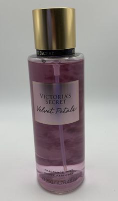 Victoria's Secret Velvet Petals Fragrance Body Mist - 250ml W15 Indulge in the luxurious scent of Victoria's Secret Velvet Petals Fragrance Body Mist. This 250ml bottle of body mist is perfect for adding a touch of elegance and glamour to your everyday routine. The scent features a blend of lush velvet petals and warm notes, creating a captivating and alluring fragrance that lingers throughout the day. The convenient spray bottle makes it easy to apply a light mist of the enchanting scent, leaving you feeling refreshed and confident. Whether you're heading to work, out for a night on the town, or simply relaxing at home, this body mist is the perfect finishing touch to any outfit. Treat yourself to the irresistible allure of Victoria's Secret Velvet Petals Fragrance Body Mist and experienc Viktoria Secret, Victoria Secret Body, Body Mist, Christmas List, Makeup Essentials, Body Spray, Victoria's Secret, Spray Bottle