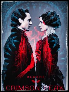 two people standing next to each other in front of a poster that says beware crimson peak