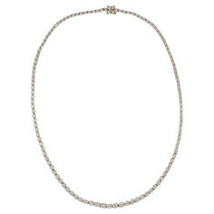 An estate Tiffany & Co. Victoria graduated round diamond riviera necklace in 18K yellow gold. There are 115 round brilliant-cut diamonds that total 10.18 carats and 4 marquise-shaped diamonds at the clasp that total 0.21 carats. All diamonds are E-F color and VVS1-2 clarity. The necklace measures 16 inches in length. Comes with original box. Circa 2000. Riviera Necklace, Snow Queen, Tiffany And Co, Round Brilliant Cut Diamond, Brilliant Cut Diamond, Tiffany & Co., Round Diamond, Round Diamonds, Diamond Necklace