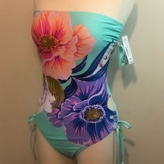 Gorgeous Strapless/Neck Strap One Piece Swimsuit. Features Floral Design On Mint Background, Ties At Hip. Has Optional Neck Strap That Comes With. Size Small. New With Tags. All Items From A Smoke Free Environment. Catrine Demew, Mastectomy Swimsuits, Training Swimsuits, Maaji Swimwear, Mint Background, Green One Piece, Floral Tankini, Bathing Suits One Piece, Plus Size One Piece