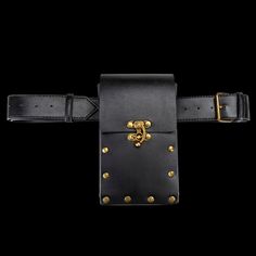 A fusion of fearless Norse spirit and modern functionality, designed for the bold and adventurous women who carry the essence of Viking heritage within them. Wear it proudly around your waist, the adjustable leather strap ensuring a comfortable fit that's tailored to you. The antique bronze buckle not only adds an element of antiquity but also offers quick access to your belongings, making this waist bag the perfect blend of tradition and convenience. Details: Made of PU leather Length: 50.78" ( Travel Leather Belt Bag With Belt Included, Luxury Belt Bag For Travel, Black Belt Bag For Travel With Belt Included, Black Belt Bag With Belt Included For Travel, Leather Belt Bag With Metal Hardware For Travel, Everyday Leather Belts With Brass Hardware, Vintage Belt Bag With Belt Loops For Everyday Use, Steampunk Style Black Belt Bag For Everyday Use, Fantasy Bag Belt