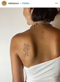 a woman with a tattoo on her back