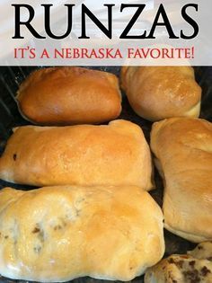 some bread rolls sitting on top of a cooling rack with the words runzas it's a nerbaska favorite