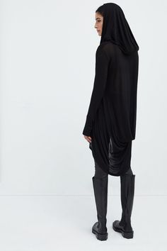 Meet our Oslo Tunic, the definition of elevated loungewear. Fashioned from soft and high-stretch sheer European jersey, she offers comfort that you can live in for days on end. Oslo updates the tunic silhouette with stunning details, such as an oversized hood and a draped, high-low hem that dips at the back. Her dropped shoulders extend to relaxed long sleeves, complete with thumbholes for a cozy, finishing touch. Shop also her best-selling sister hoodie, Firenze, crafted from our European Frenc Elevated Loungewear, Hooded Tunic, Black Tunic, High Low Hem, Petite Size, Womens Clothing Tops, High Low, Winter Outfits, Tunic Tops