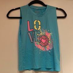 Rock Candy Turquoise Tank. Nwt. Never Worn. Size Small Blue Graphic Print Tank Top For Spring, Spring Blue Graphic Print Tank Top, Blue Sleeveless T-shirt With Graphic Print, Blue Fun Spring Tops, Fun Blue Spring Top, Fun Blue Spring Tops, Light Blue Casual Tops For Playwear, Blue Playful Tank Top, Playful Blue Sleeveless Tank Top