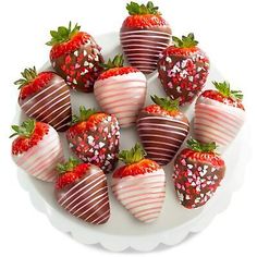 chocolate covered strawberries arranged on a white plate