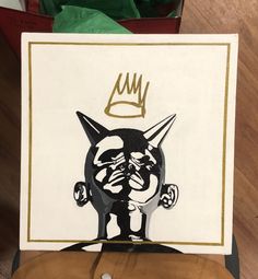 a drawing of a cat with a crown on it's head