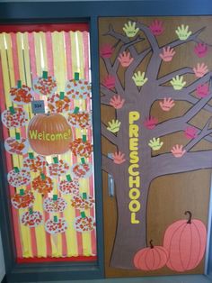 the front door is decorated with fall decorations