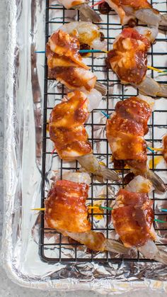 chicken wings on a baking sheet with ketchup