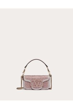 Valentino Garavani Locò small shoulder bag with rhinestone appliqué and Swarovski covered VLogo Signature element. Equipped with both a detachable sliding chain strap and a detachable handle, this accessory can be worn as a crossbody/shoulder bag or carried as a handbag. - Magnetic closure - Removable leather handle - Removable sliding chain shoulder strap - Nappa leather lining. Interior: one slip pocket  Shoulder strap drop length: min. 33 cm to max. 55 cm / min. 12.9 in. to max. 21.6 in. - Di Jewel Logo, Embroidered Shoulder Bag, Sequin Bag, Denim Shoulder Bags, Crystal Bags, Embellished Denim, Rhinestone Appliques, Crystal Rose, Embroidered Bag