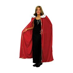 a woman in a red cape and black dress standing with her hands on her hips