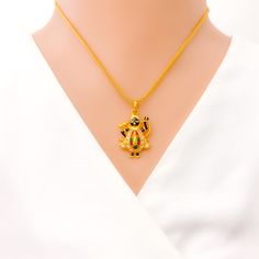 Indulge in luxury with our CZ Accented Shri Nath ji Pendant, crafted from 22k yellow gold and weighing 4.9 grams. The stunning cubic zirconia detailing on this pendant perfectly accentuates the intricate work of Shri Nath ji. With a sleek 1.3" length, this pendant adds a touch of sophistication to any outfit. Make a statement with this fashion-forward accessory that exudes opulence and elegance. PRODUCT DETAILS Gold Purity(karat): 22k Gold Weight(grams): 4.9 Item Finish: Yellow Gold Stone: Cubic Gold Diamond Temple Necklace Gift, Gold Diamond Temple Necklace For Gift, Shri Nath Ji, Gold Stone, 22k Gold, Gold Pendant, Arrow Necklace, Cubic Zirconia, Fashion Forward