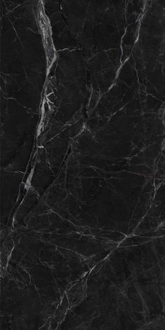 black marble textured with white vein lines