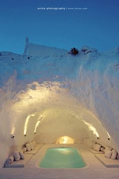 an indoor swimming pool in the middle of snow