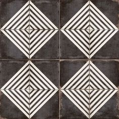 black and white tile with diamond shapes on it