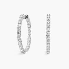 Stunning lab grown diamonds sparkle along the front edges of these elegant eternity hoop earrings. The cool gleam of the 14k white gold design beautifully complements the shimmer of the stones. Blue Nile, Diamond Eternity, Gold Design, The Cool, Lab Grown, Lab Grown Diamonds, Lab, Hoop Earrings, Diamonds