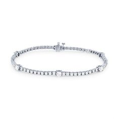 A classic design with modern flair, this tennis bracelet features 70 round brilliant cut diamonds totaling 2.50 carats. Alternating throughout are larger diamonds, giving it a contemporary look. Diamonds Direct, Diamond Tennis Bracelet, Tennis Bracelet Diamond, Tennis Bracelet, Round Brilliant Cut Diamond, Brilliant Cut Diamond, Round Brilliant, Womens Jewelry Bracelets, Classic Design