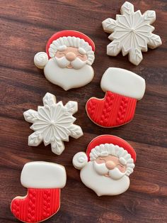 christmas cookies decorated like santa claus and snowflakes on a wooden table with text overlay