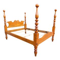 a wooden bed frame with four posts and no headboard or foot board is shown against a white background