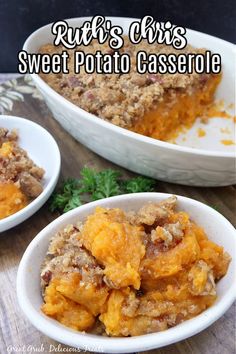 sweet potato casserole in two white bowls on a wooden table with parsley