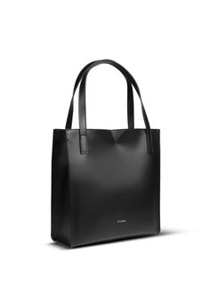 DETAILS: A favorite season after season. This classic tote features a top zip closure, slip pocket and color contrasting interior. Work tote Two top handles Top zip closure Colour contrasting interior 1 interior slip pocket Double shoulder straps Metal purse feet Removable pouch with crossbody strap Removable pouch is lined with recycled bottle lining Large slip pocket Made with 100% vegan leather PETA-Approved Vegan SIZE: Dimensions L 13" X H 13" X D 4.75" Drop Handle: 5" Max. crossbody drop ha Minimalist Double Handle Bags For Errands, Minimalist Double Handle Bag For Errands, Minimalist Shopping Bags With Double Handles, Modern Double Handle Bags For Errands, Minimalist Satchel With Double Handle For Shopping, Minimalist Double Handle Satchel For Shopping, Black Minimalist Bag With Double Handle, Minimalist Black Bag With Double Handle, Modern Shoulder Bag With Top Carry Handle For Errands