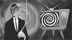 a man in a suit and tie standing next to an old tv with a spiral design on it