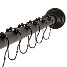 an image of a rack with many black balls on the top and one ball attached to it