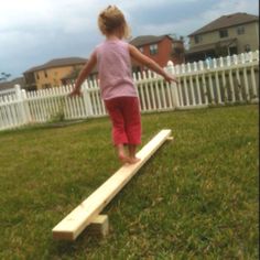 Quick balance beam for kids. One 2x4 and two pieces of 4x4 put together with nails. Sand to get rid of roughness. About $5 total. Great tool to increase your child's gross motor skills and balance! Backyard Jungle Gym, Garden Kids, Outdoor Play Areas, Outdoor Games For Kids, Natural Playground, Balance Beam, With Nails