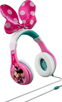 the minnie mouse headphones are pink with white polka dots and a bow on top