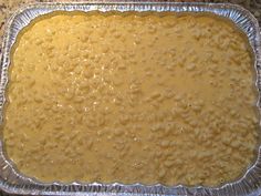 a metal pan filled with food on top of a counter