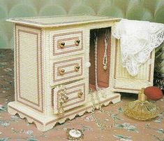 an old fashioned dresser has been decorated with beading and beads on the top shelf