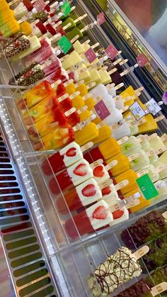 an assortment of different types of desserts on display