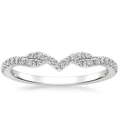 a white gold wedding band with diamonds