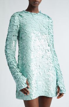 Scaled with shiny paillettes, this long-sleeve dress serves the label's ocean-inspired ease in a refreshing shade of mint. Thumbhole cuffs and a softly undulating hem complete this silk-lined look. 33" length (size 1) Hidden back-zip closure Jewel neck Long sleeves with thumbhole cuffs Silk lining 100% silk with 100% PVC contrast Dry clean Imported Designer Clothing Green Long Sleeve Sequin Dress, Long Sleeve Sequin Evening Dress For Spring, Spring Long Sleeve Embellished Sequin Dress, Corset Lace Dress, Long Sleeve Jersey Dress, Frill Mini Dress, Designer Clothing Brands, Long Sleeve Cocktail Dress, Mint Dress